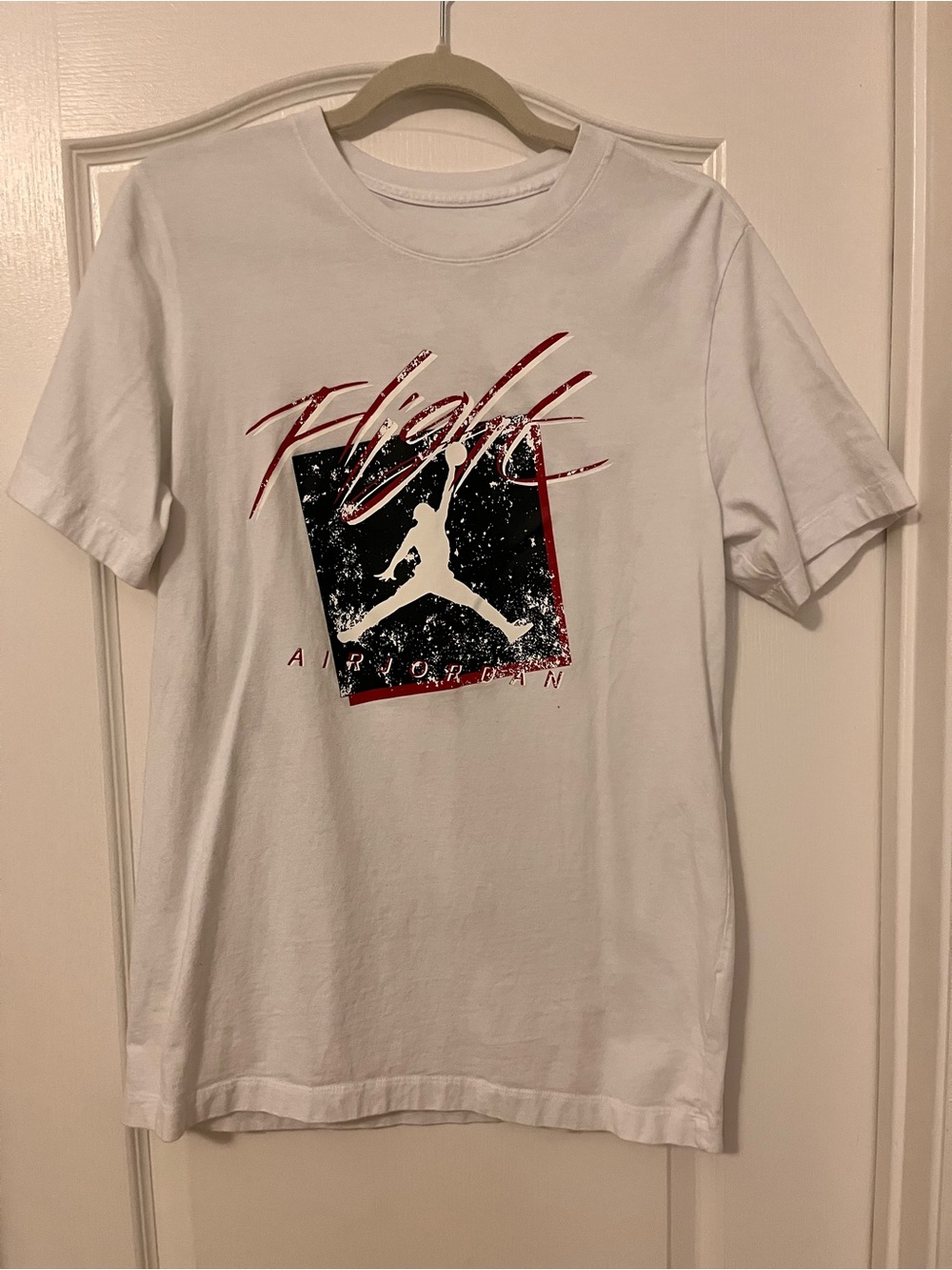 Jordan White Short Sleeve Tee with Red and Black Jumpman Graphic